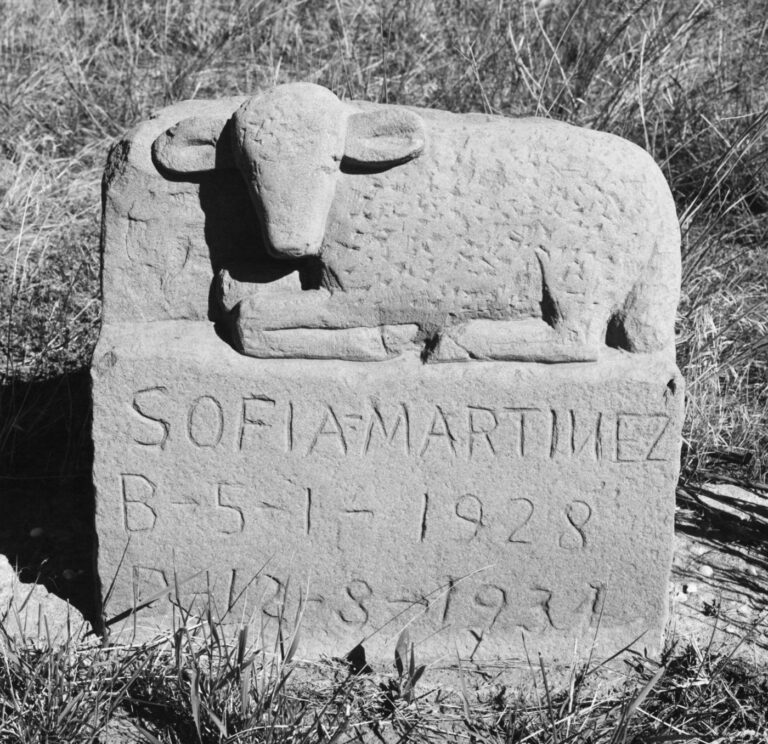 A locally quarried and cut grave marker of red sandstone - Robert Adams 