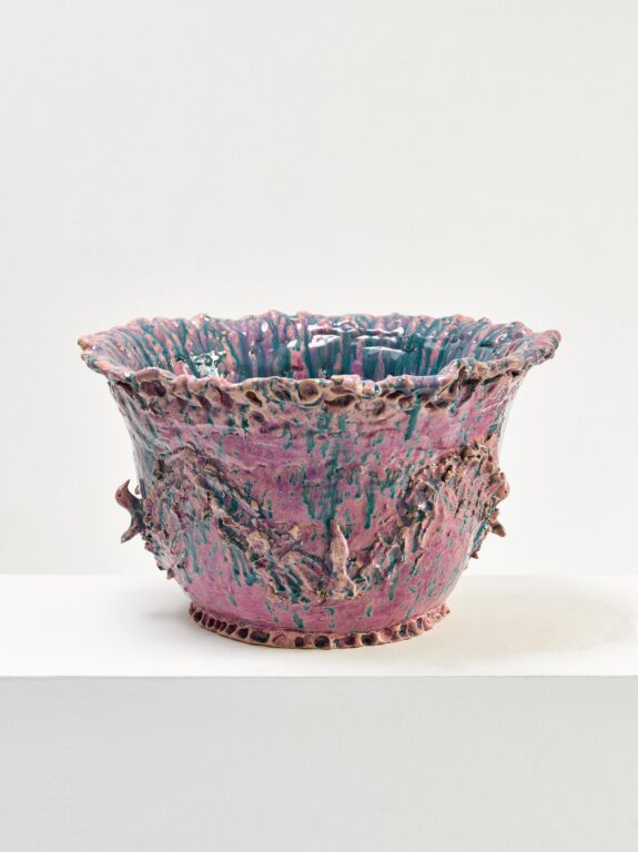 As evening comes, I look out over the lake. Many people there are catching fish in nets 